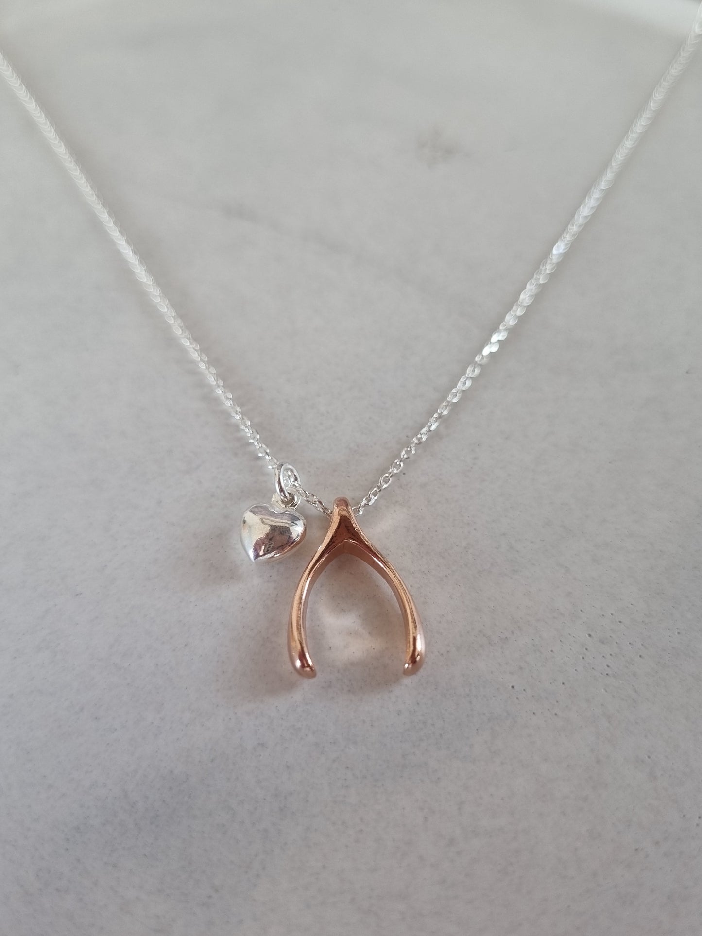 Wishbone and heart pendant on chain