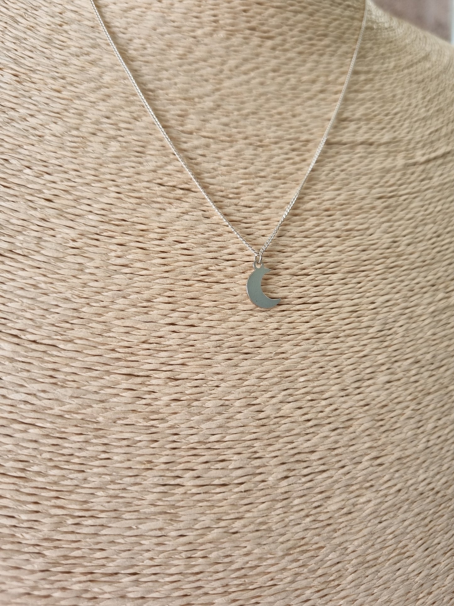 Crescent moon pendant