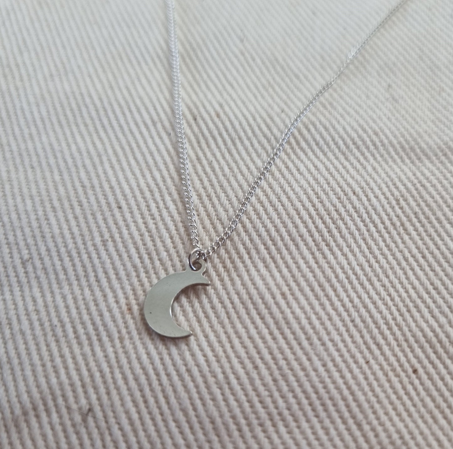 Crescent moon pendant