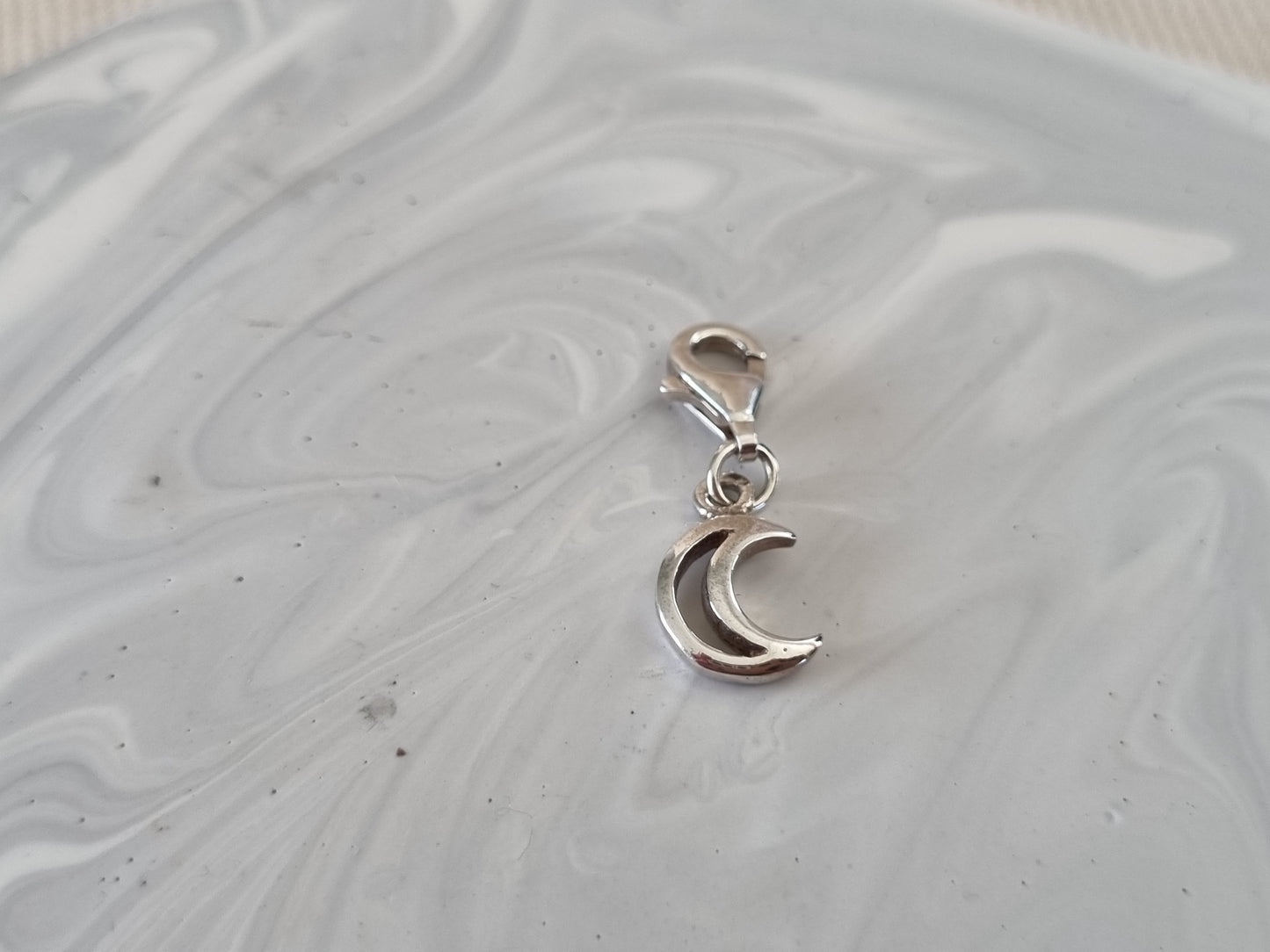 Crescent moon charm