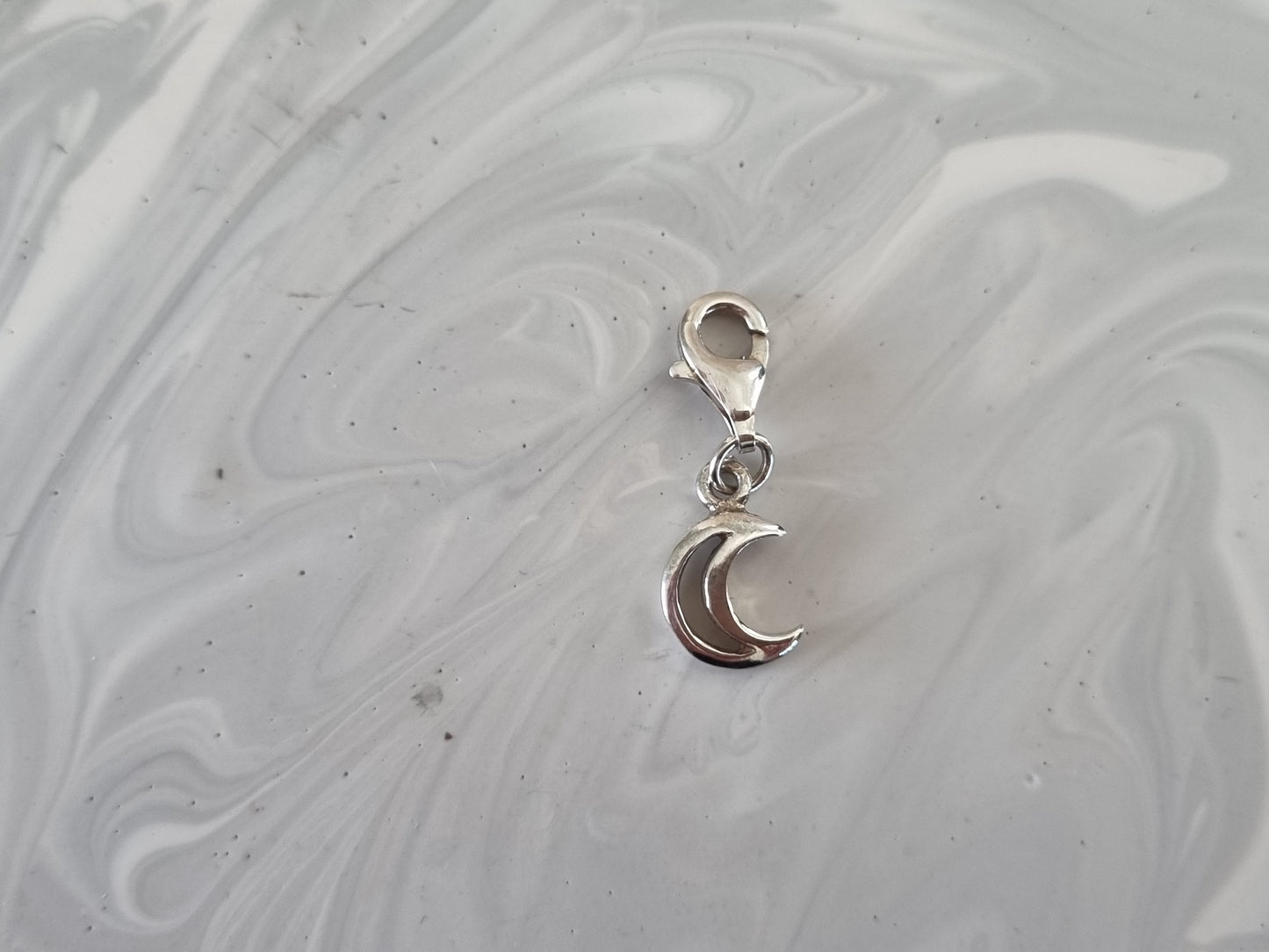 Crescent moon charm