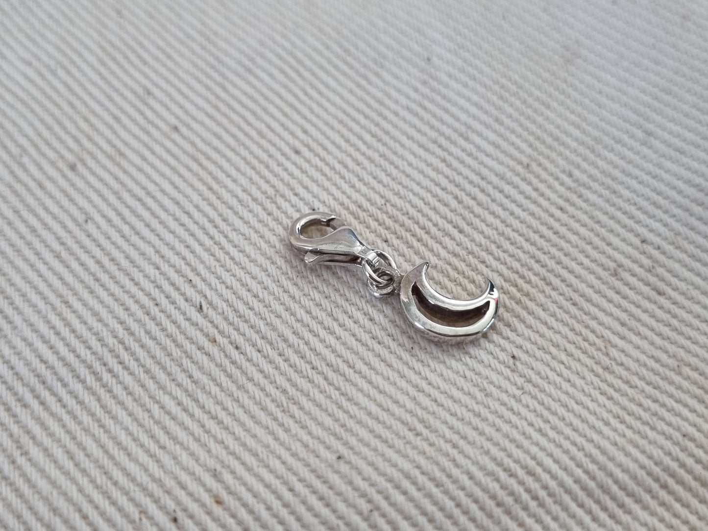 Crescent moon charm