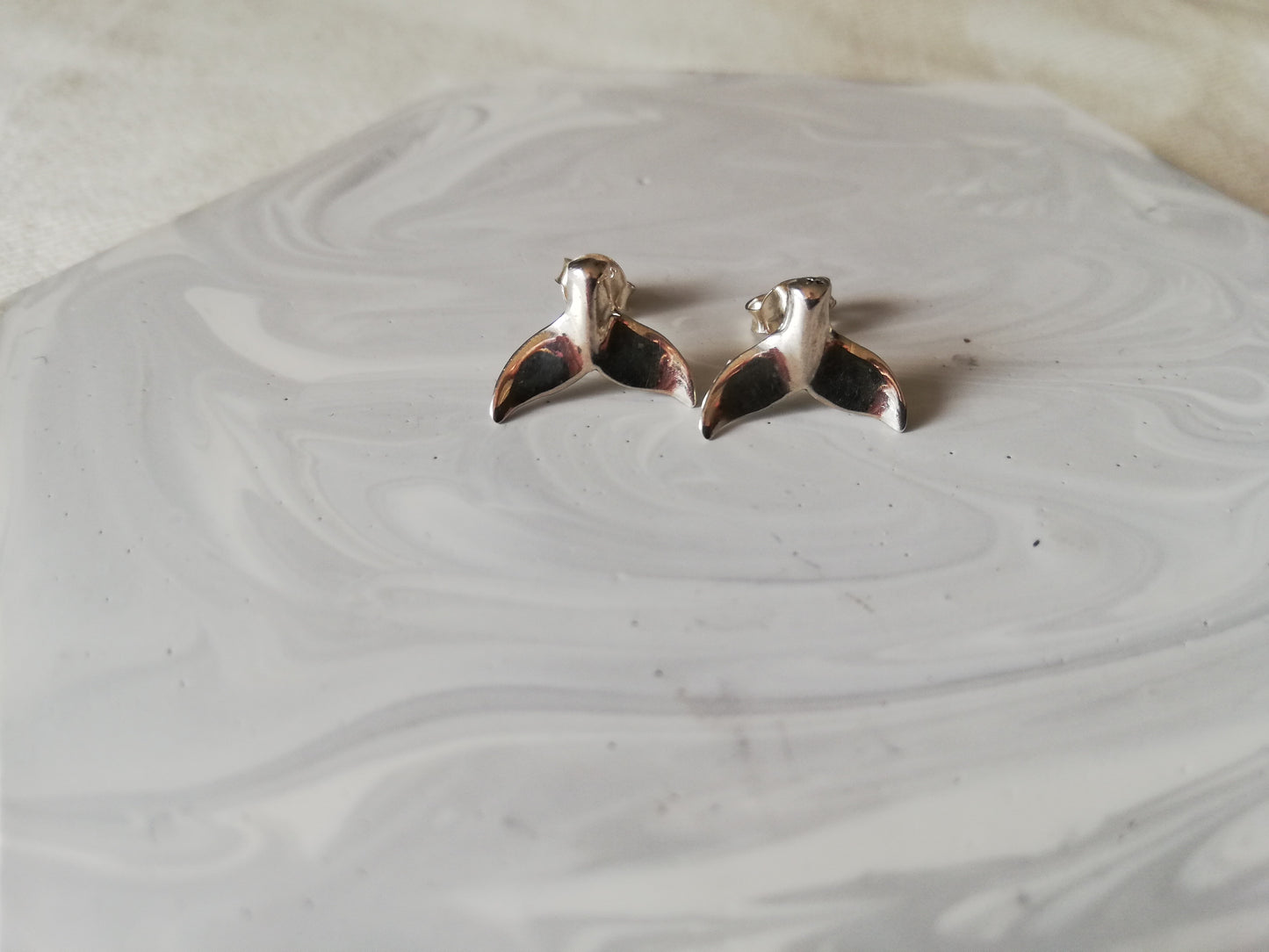 Whale tail studs