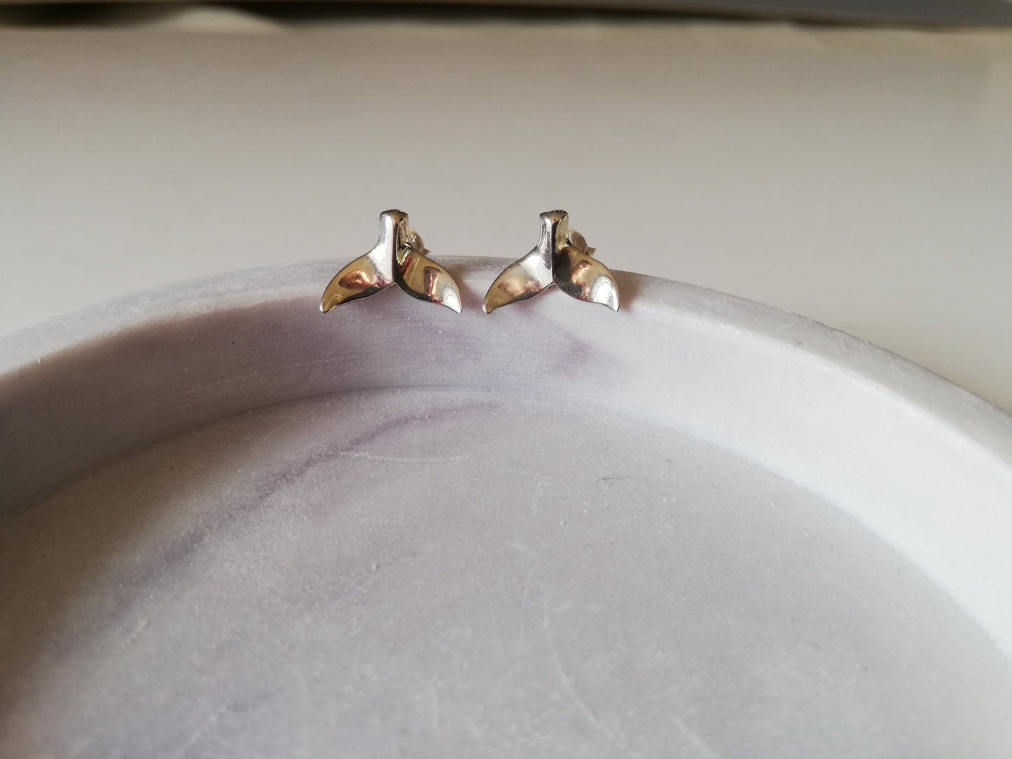 Whale tail studs